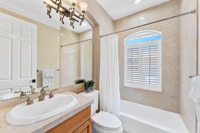 full bathroom featuring vanity, an inviting chandelier, crown molding, toilet, and shower / tub combo with curtain