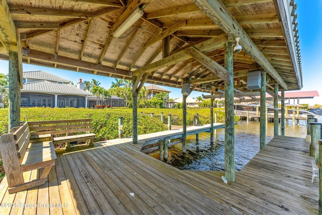 view of dock with a water view and boat lift