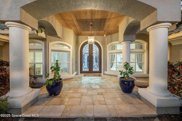 doorway to property with french doors