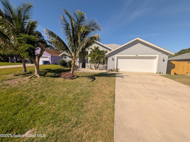 687 Americana Blvd NW, Palm Bay, FL 32907 - ranch-style house featuring a garage, stucco siding, concrete driveway, and a front yard