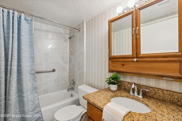 full bathroom with wallpapered walls, toilet, shower / bath combo with shower curtain, a textured ceiling, and vanity