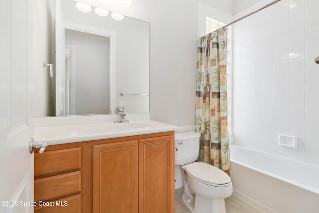 full bathroom featuring shower / tub combo with curtain, vanity, and toilet