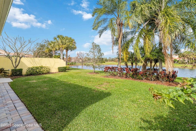 view of yard with a water view