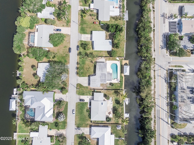 112 Sunset Dr, Cocoa Beach, FL 32931 - aerial view of property's location with a pool area and nearby suburban area