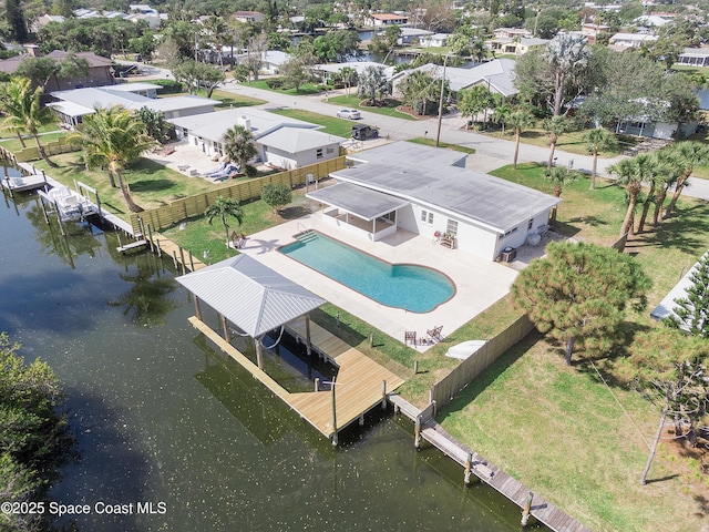 112 Sunset Dr, Cocoa Beach, FL 32931 - aerial perspective of suburban area with a large body of water and a pool area
