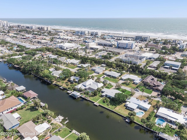 112 Sunset Dr, Cocoa Beach, FL 32931 - aerial view of property's location with a large body of water and nearby urban area
