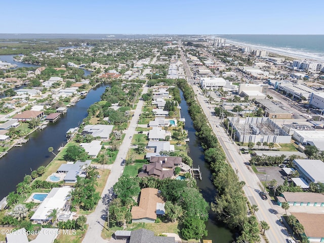 112 Sunset Dr, Cocoa Beach, FL 32931 - aerial view of property and surrounding area featuring a nearby body of water