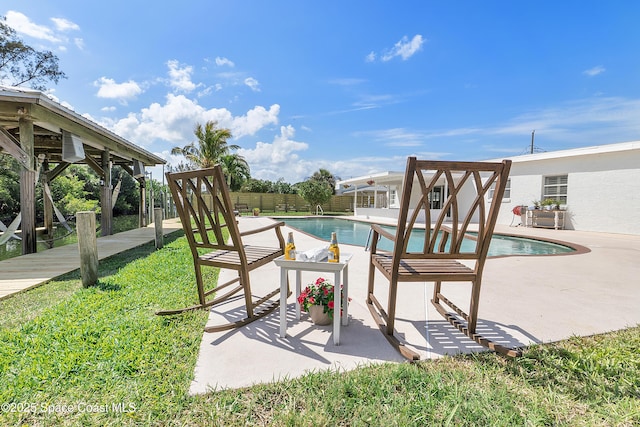 112 Sunset Dr, Cocoa Beach, FL 32931 - view of swimming pool featuring a patio area and fence