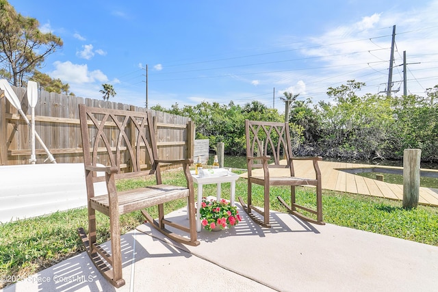 112 Sunset Dr, Cocoa Beach, FL 32931 - view of patio / terrace featuring fence