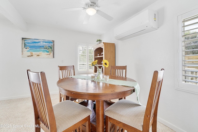 112 Sunset Dr, Cocoa Beach, FL 32931 - dining area featuring a wall mounted AC, baseboards, and a ceiling fan