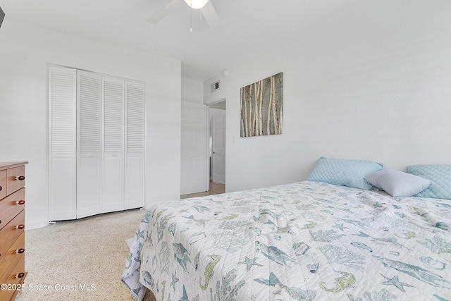 112 Sunset Dr, Cocoa Beach, FL 32931 - bedroom with a closet and ceiling fan