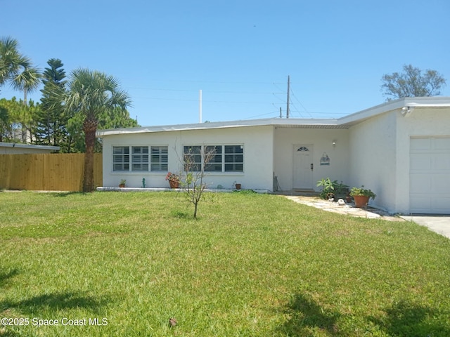 112 Sunset Dr, Cocoa Beach, FL 32931 - ranch-style home featuring stucco siding and a garage