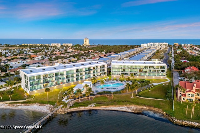 225 Strand Dr Unit 401, Melbourne Beach, FL 32951 - drone / aerial view with a water view