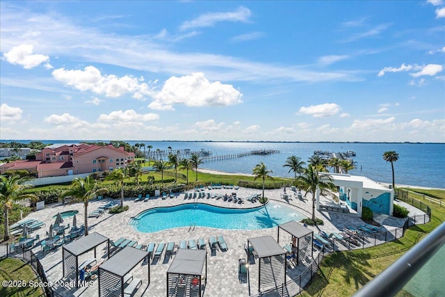225 Strand Dr Unit 401, Melbourne Beach, FL 32951 - pool featuring a patio and a water view