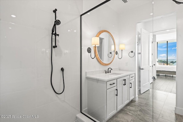225 Strand Dr Unit 401, Melbourne Beach, FL 32951 - bathroom with tiled shower, ensuite bath, and vanity