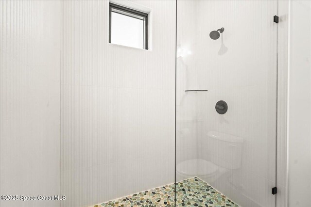 225 Strand Dr Unit 401, Melbourne Beach, FL 32951 - bathroom featuring a tile shower