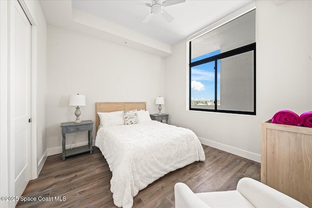 225 Strand Dr Unit 401, Melbourne Beach, FL 32951 - bedroom featuring a closet, a ceiling fan, baseboards, and wood finished floors