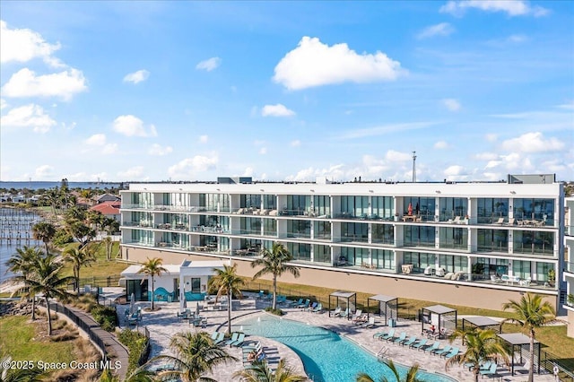 225 Strand Dr Unit 401, Melbourne Beach, FL 32951 - community pool featuring a patio