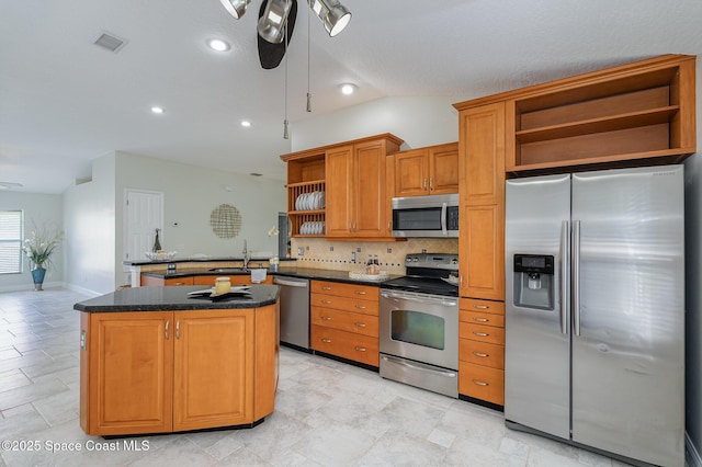 kitchen featuring open shelves, appliances with stainless steel finishes, dark countertops, and visible vents