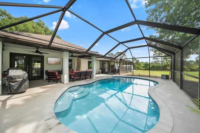 pool featuring a patio, an outdoor hangout area, ceiling fan, a grill, and a lanai