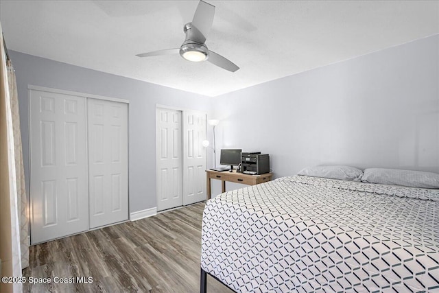 bedroom with ceiling fan and wood finished floors