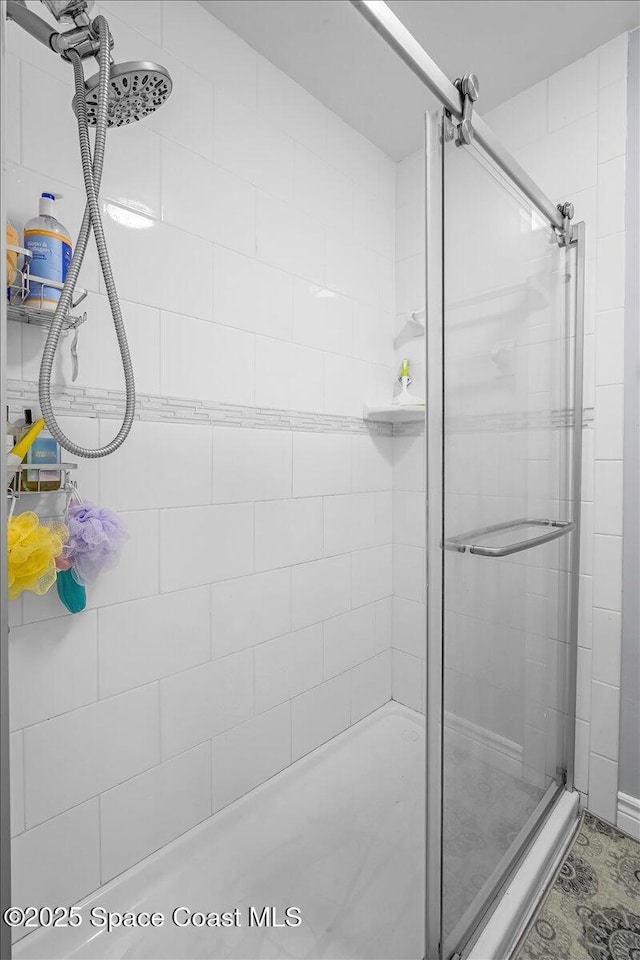 full bathroom featuring a stall shower