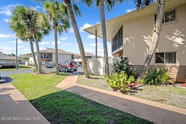 view of yard featuring a residential view