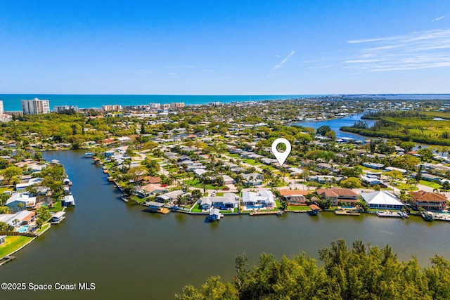 drone / aerial view with a water view