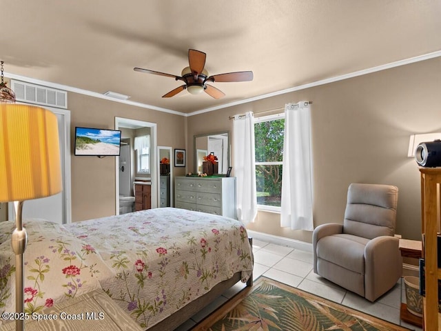 bedroom featuring tile patterned floors, visible vents, a ceiling fan, crown molding, and baseboards