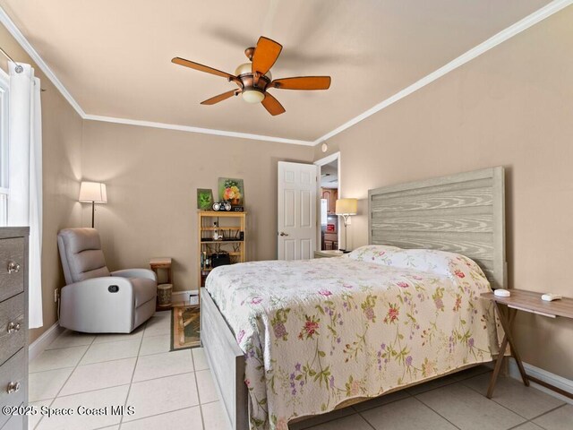 bedroom featuring ceiling fan, baseboards, light tile patterned flooring, and crown molding