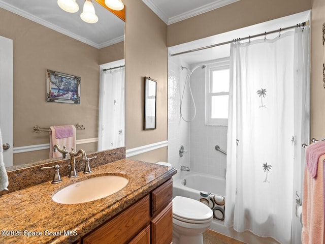 full bathroom featuring vanity, crown molding, toilet, and shower / bath combo with shower curtain