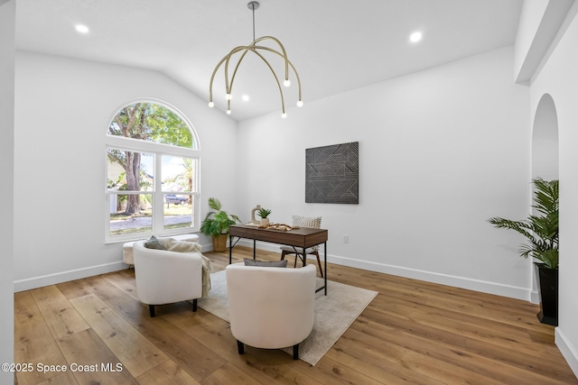 living area featuring vaulted ceiling, recessed lighting, baseboards, and wood-type flooring