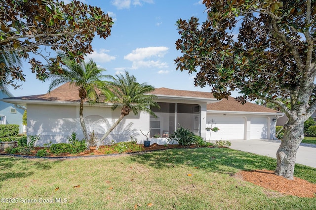 ranch-style home featuring a garage, a front yard, concrete driveway, and stucco siding