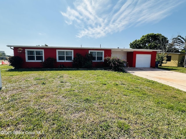 ranch-style home with a garage, driveway, a front lawn, and stucco siding