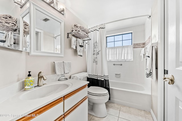 full bathroom with visible vents, toilet, shower / bath combo, tile patterned flooring, and vanity