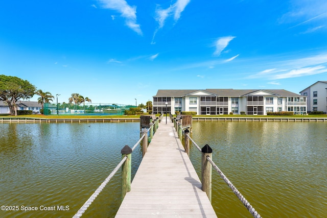 dock area featuring a water view