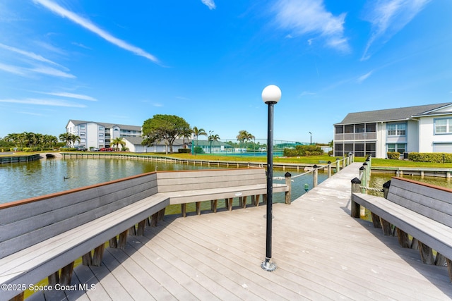 view of dock with a water view