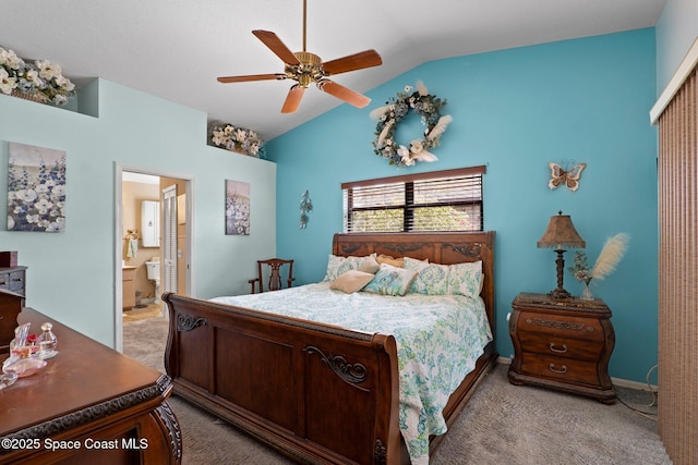 2033 Thistle Dr, Melbourne, FL 32935 - bedroom with a ceiling fan, vaulted ceiling, baseboards, light carpet, and ensuite bath