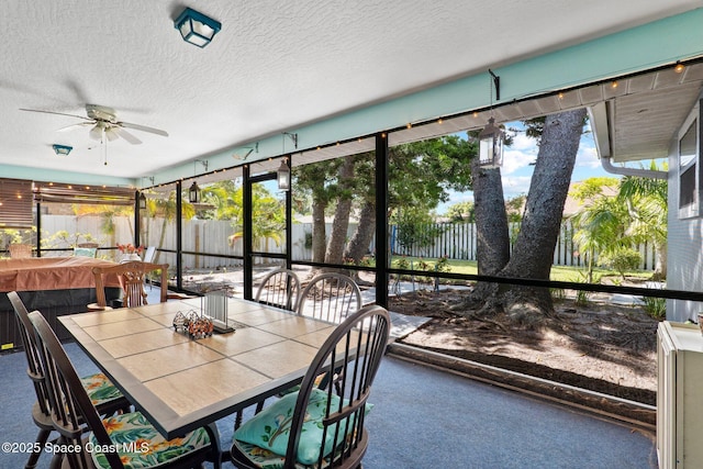 2033 Thistle Dr, Melbourne, FL 32935 - sunroom / solarium featuring a ceiling fan and outdoor dining area