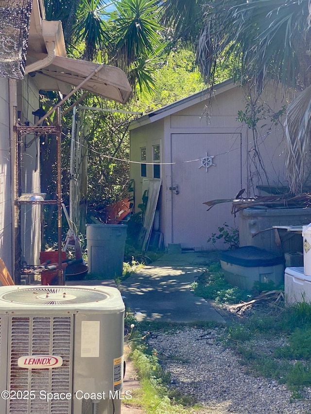 view of outdoor structure with cooling unit