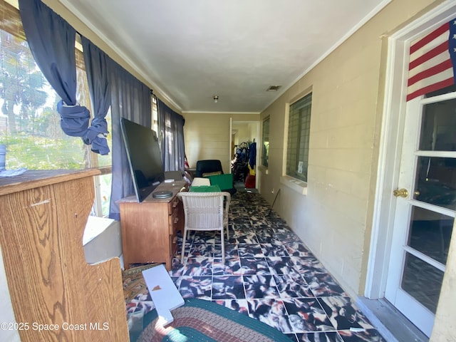 sunroom / solarium featuring visible vents