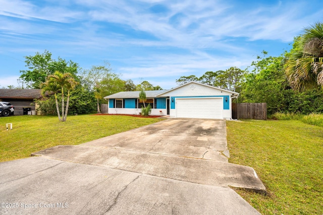 ranch-style home with a garage, driveway, a front yard, and fence