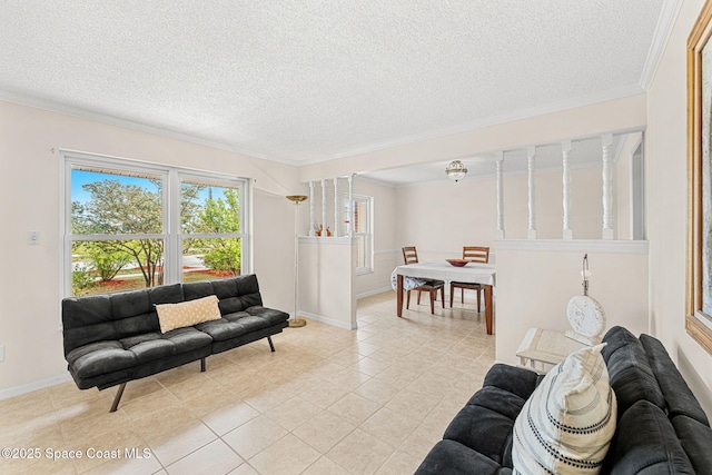 living area with baseboards, crown molding, light tile patterned floors, and a textured ceiling