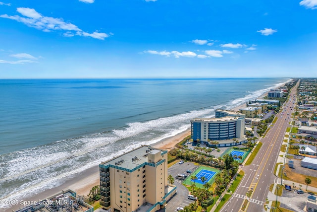 aerial view with a beach view and a water view