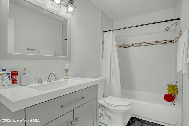 bathroom featuring vanity, toilet, and shower / tub combo with curtain