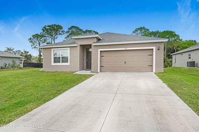 view of front of home featuring a front yard, driveway, central AC, and stucco siding