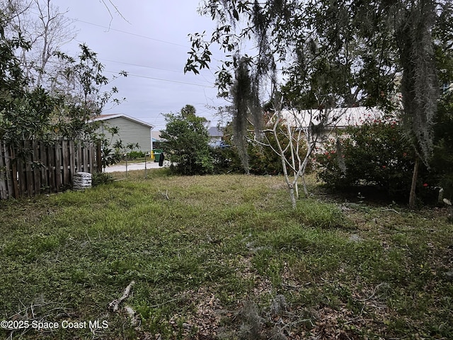 view of yard featuring fence