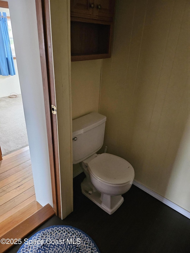 bathroom featuring toilet