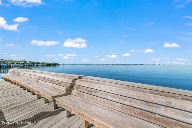 view of dock with a water view