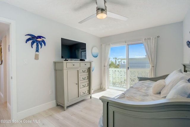 bedroom with light wood-style flooring, ceiling fan, baseboards, and access to outside